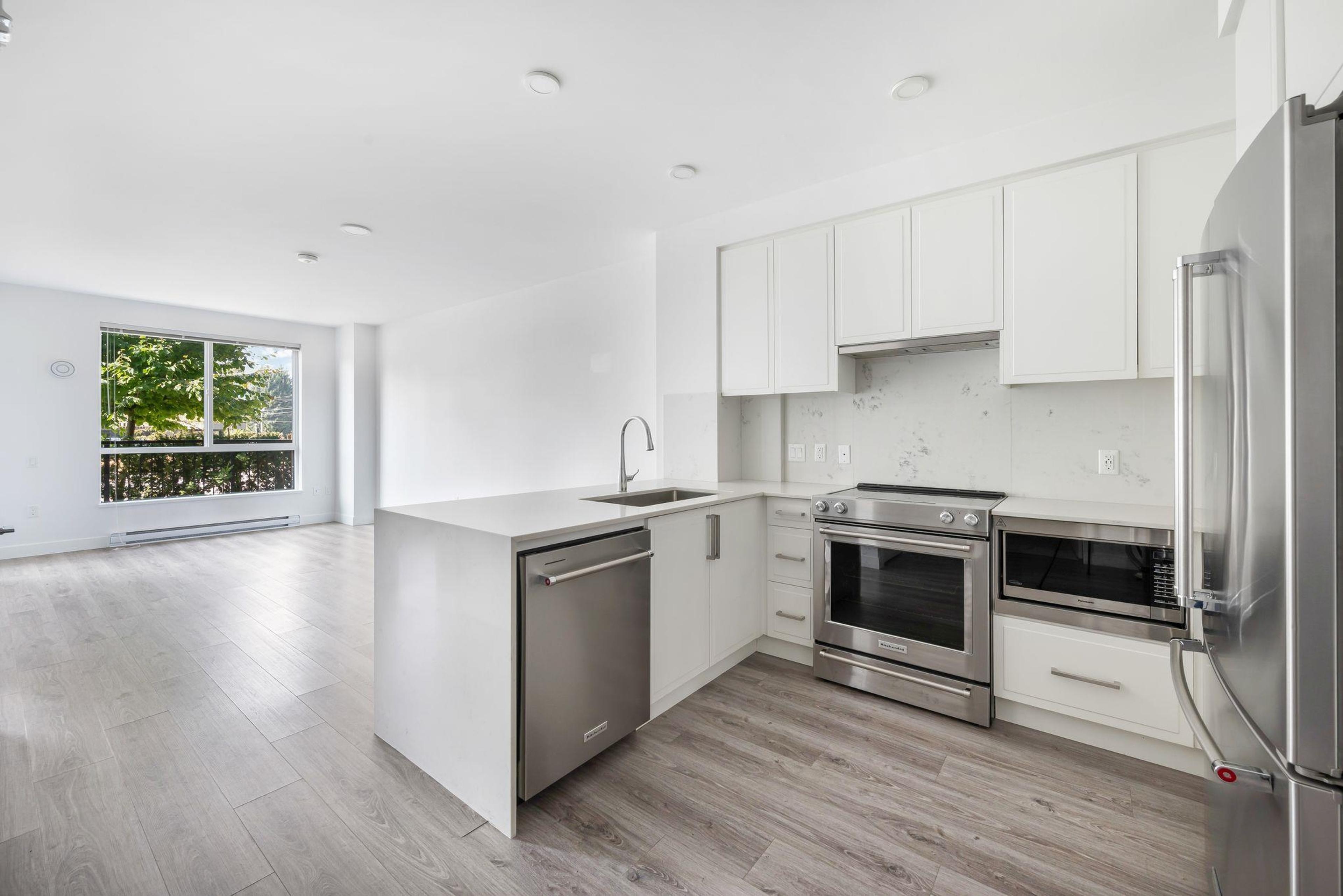 #102 700 CLARKE ROAD - Image 11